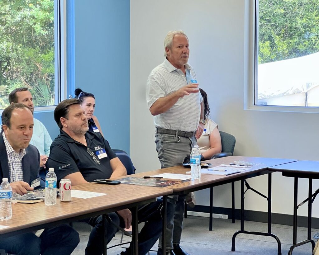 Mike Saucier of Gulf States speaking at the LA 1077 Business Executive Roundtable.