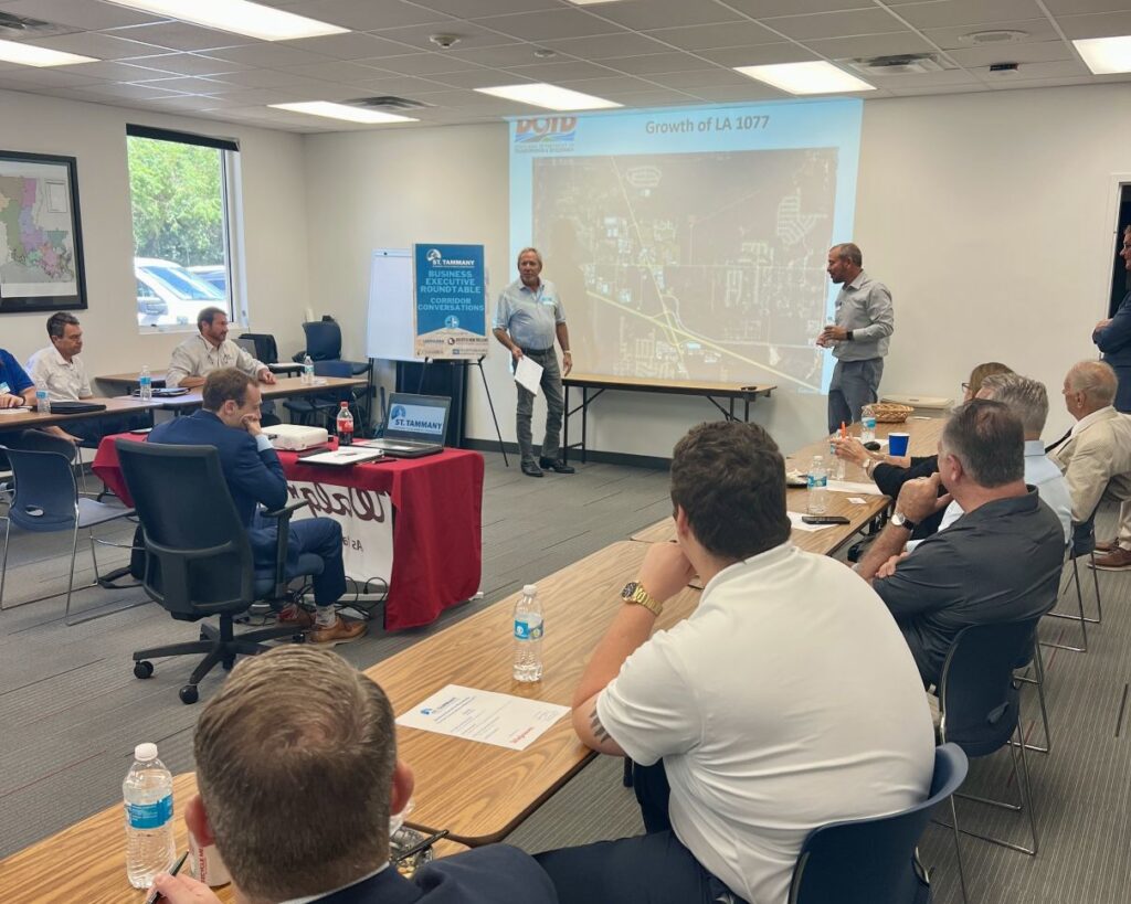 Mike Saucier and Ryan Hoyt, P.E., during the Highway 1077 Executive Roundtable.
